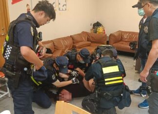 Man, 44, Allegedly Holds Cathay Pacific Intern Hostage at Taoyuan Airport After Reported Argument With Wife Taiwan Aviation Police subduing suspect at Taoyuan Airport