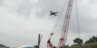 Construction site with cranes in Singapore, illustrative of worksite safety