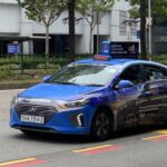 ComfortDelGro taxi on a Singapore street (stock photo)