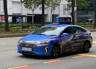 Taxi Driver, 66, Died After Cab Rolled Forward While He Was Helping Passengers Unload Luggage, Inquest Hears ComfortDelGro taxi on a Singapore street (stock photo)