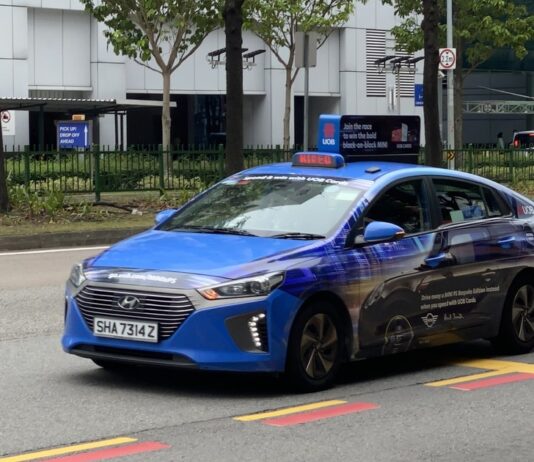 Taxi Driver, 66, Died After Cab Rolled Forward While He Was Helping Passengers Unload Luggage, Inquest Hears ComfortDelGro taxi on a Singapore street (stock photo)