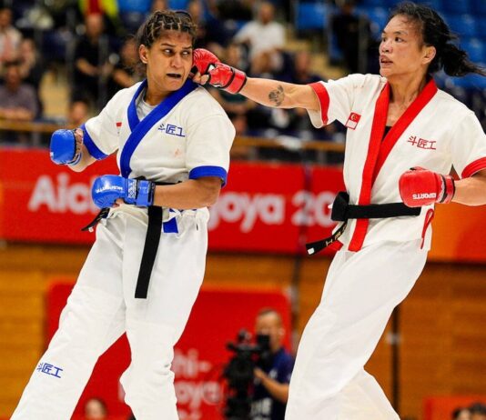 Tiffany Teo of Singapore striking during Asian Games 2026 MMA (SNOC/Kong Chong Yew via ActiveSG)