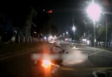 3 Traffic Police Officers Investigated After Dashcam Shows Motorcycles Cutting in Front of Car in Ubi Dashcam still of Traffic Police motorcycle cutting in front of car near Ubi