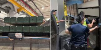 ICA officers inspecting lorry with concrete piles where duty-unpaid cigarettes were concealed at Tuas