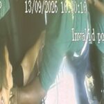 CCTV still of worker grabbing chartered bus driver Cai Zhi Feng by the face during workers brawl