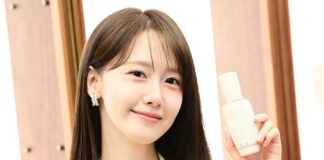Girls’ Generation’s Yoona holding a Sulwhasoo product at a brand photocall