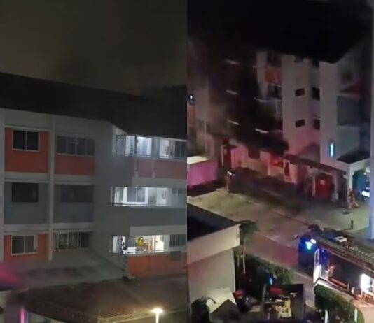 Bukit Batok Coffee-Shop Fire Sends 1 to Hospital; About 30 Evacuated Fire at Bukit Batok West Avenue 4 coffee shop block at night, with fire engine below (Image: Threads, TikTok via 8world)