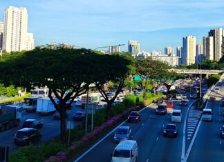 LTA Proposes Merging COE Categories A & B, With Rebates or Surcharges of Up to S$15,000 Illustrative photo of weekday traffic on the Pan Island Expressway in Singapore, with HDB and condo blocks in the background; number plates blurred (Photo: ZKang123 / Wikimedia Commons, CC BY-SA 4.0)