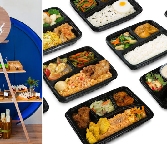 Deli Hub Catering branded display and packed meal boxes