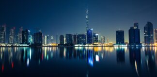 Illustrative photo of the Dubai skyline at night with the Burj Khalifa, not linked to the people or places in the case (Photo: Robert Bock / Unsplash via Wikimedia Commons, CC0)