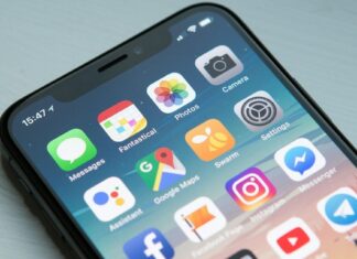 Smartphone home screen showing social media apps (non-literal stock)