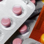 Blister packs of pills (non-literal stock; not the Geylang stalls)
