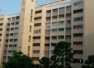 HDB Resale Prices Fall for 3rd Straight Quarter Despite Removal of 15-Month Wait-Out Rule HDB flat blocks in Singapore representing the resale housing market