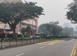 A hazy road in Singapore during the October 2026 haze