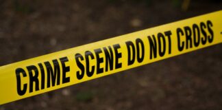 Crime scene tape (Pexels stock; non-literal, no minors or school identified)