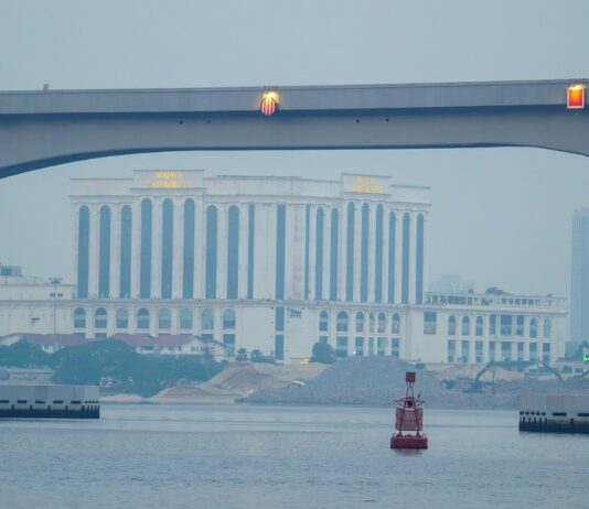 Johor Bahru waterfront seen from Woodlands through the RTS viaduct during the 2026 haze