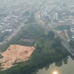 Johor Orders All Schools Closed on 8 & 9 Oct as Haze Worsens Aerial view of Batu Pahat town in Johor covered in haze on the evening of 7 Oct 2026, with a river and a bridge in the foreground (Photo: Bernama via Lianhe Zaobao)