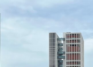 2 Singaporean Men Jailed Up to 79 Months for Laundering Money for Malaysian Syndicate Exterior of State Courts Towers in Singapore