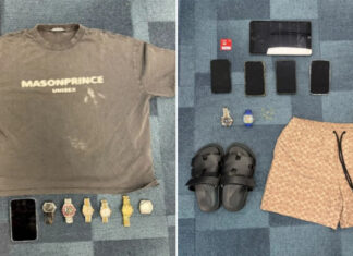 Police photos of seized phones, watches and clothing from money laundering operation