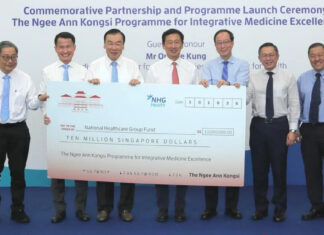 S$10 Million Donation to Fund At Least 8,000 TCM Treatments for Lower-Income Seniors Over Five Years Officials holding a ceremonial S$10 million cheque at the Ngee Ann Kongsi and NHG launch
