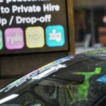 Private-hire car with Grab Gojek Ryde Tada Zig app icons (Lianhe Zaobao file photo)