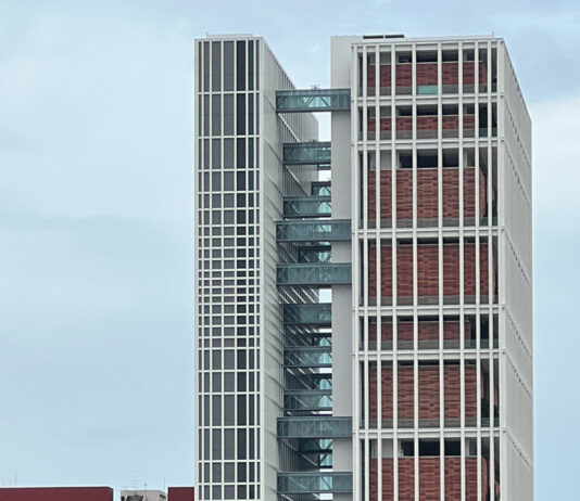 Man Gets Six Years & One Month for Helping Sarawak Syndicate Bring Money Mules Into Singapore Modern State Courts Towers building under a pale sky