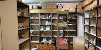 Shelves and cartons of vape products found by the authorities in one of the syndicate's storage locations during the October 2025 raids