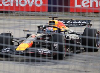 Max Verstappen driving his Red Bull car at the Marina Bay Street Circuit in Singapore