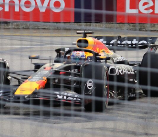 Max Verstappen driving his Red Bull car at the Marina Bay Street Circuit in Singapore